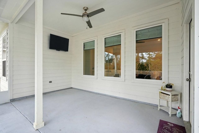 view of patio / terrace featuring ceiling fan