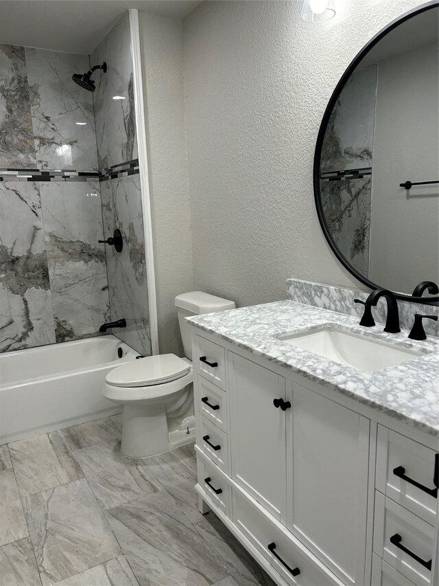 231 Dehart St Unit Cr653, Liverpool, TX 77577 - bathroom featuring vanity, bathtub / shower combination, a textured wall, and marble finish floors