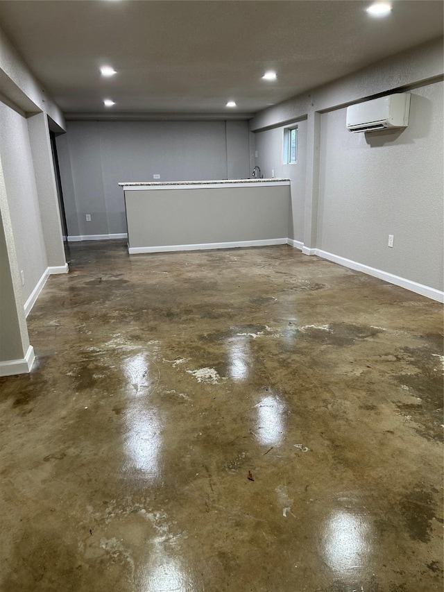 basement featuring an AC wall unit