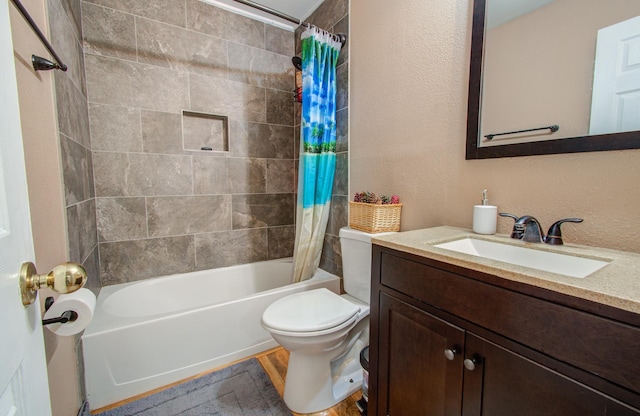 full bathroom with vanity, wood-type flooring, shower / tub combo, and toilet