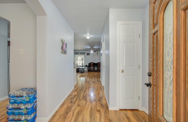hall with light wood-type flooring