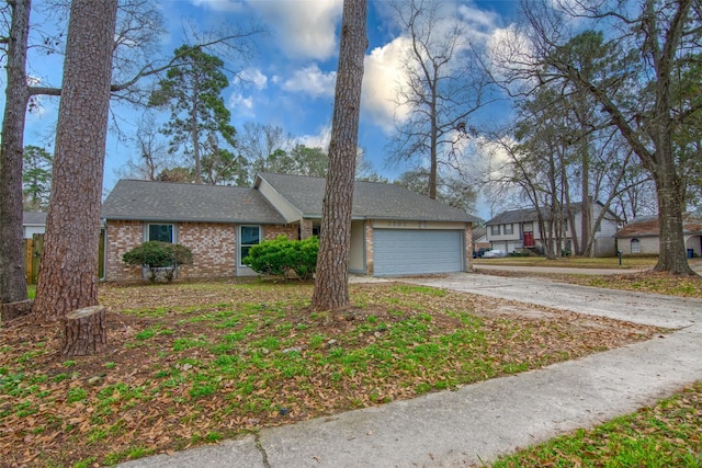 single story home featuring a garage