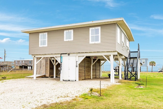 view of front of home with a front lawn