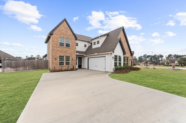 view of front of property with an attached garage, concrete driveway, a front yard, and fence