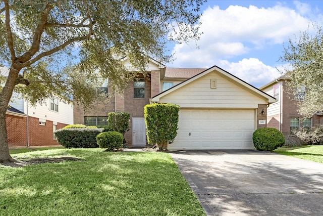 view of front of house with a garage and a front yard