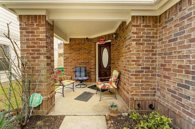 property entrance with covered porch