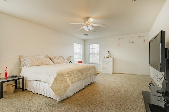 carpeted bedroom with ceiling fan