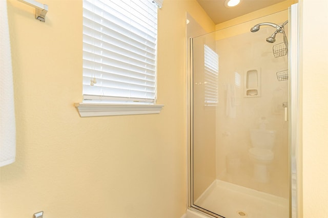 bathroom featuring walk in shower