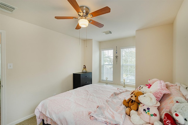 carpeted bedroom with ceiling fan