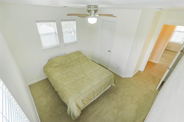 bedroom with carpet flooring and ceiling fan