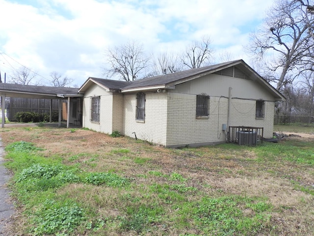 view of property exterior with a lawn