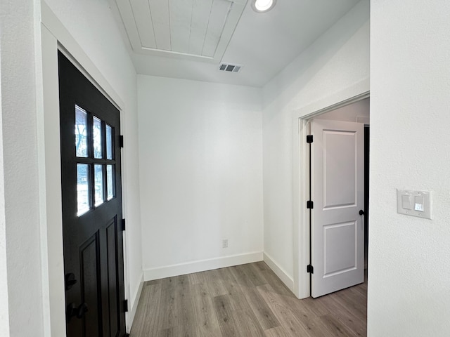 foyer entrance featuring light hardwood / wood-style flooring