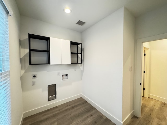 laundry room with wood-type flooring, hookup for an electric dryer, and hookup for a washing machine