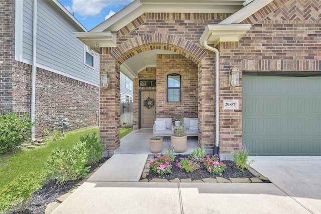 doorway to property featuring covered porch