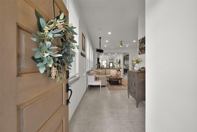 entryway featuring light tile patterned floors