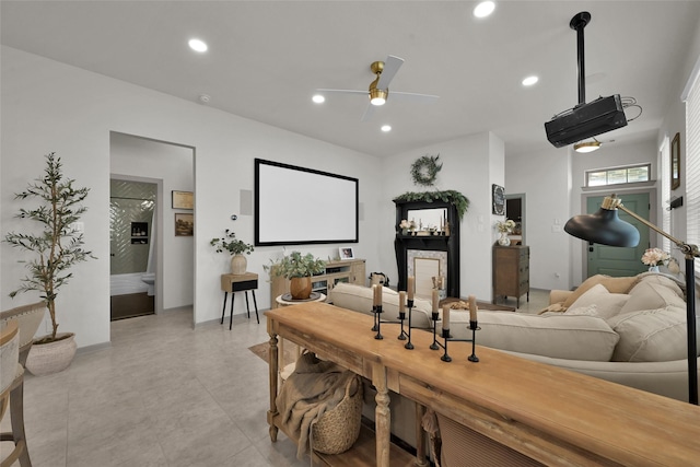 cinema room featuring ceiling fan