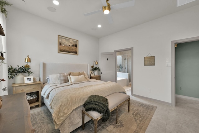 bedroom with tile patterned flooring, ceiling fan, and ensuite bathroom