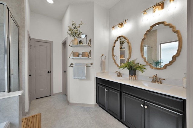 bathroom with vanity, an enclosed shower, and tile patterned floors