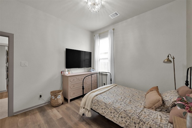 bedroom featuring light hardwood / wood-style floors