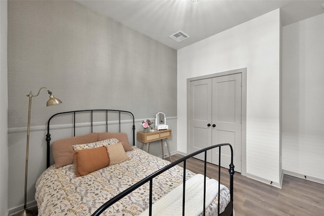 bedroom featuring hardwood / wood-style flooring