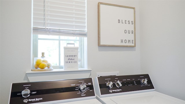 interior details featuring washing machine and clothes dryer