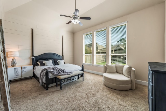 bedroom with light carpet, ceiling fan, and baseboards