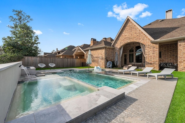 view of pool featuring a patio area, fence, and a fenced in pool