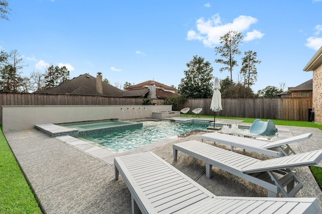 view of swimming pool with a fenced backyard, a fenced in pool, a patio, and an in ground hot tub