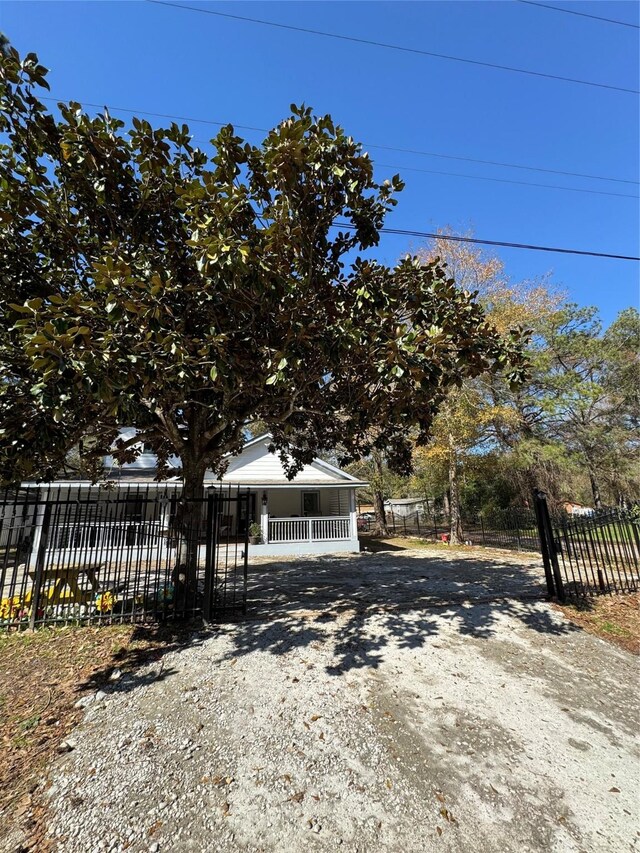 obstructed view of property with fence