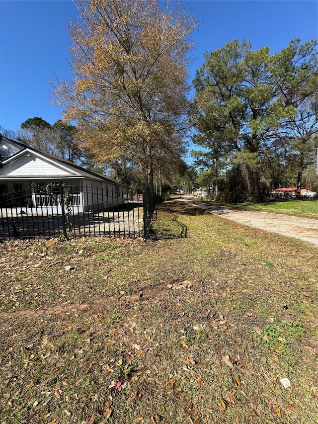 view of yard with fence