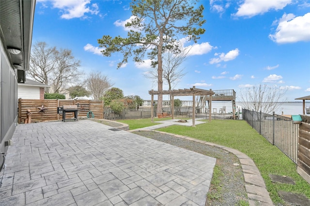 view of patio / terrace with area for grilling and a pergola