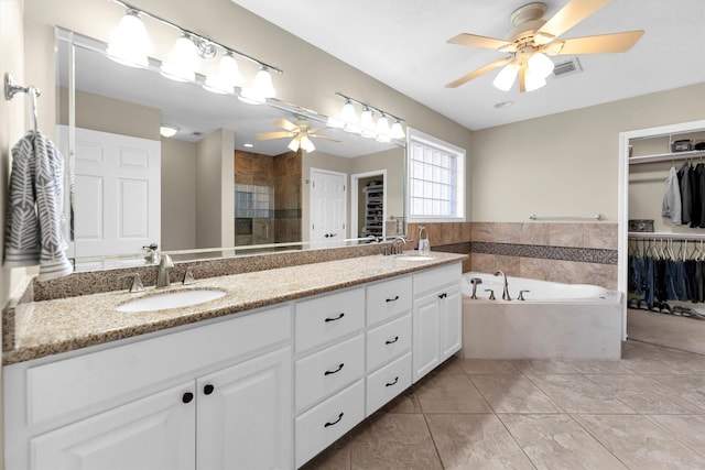 bathroom featuring vanity, tile patterned floors, ceiling fan, and separate shower and tub