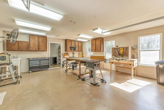 basement featuring sink and a workshop area