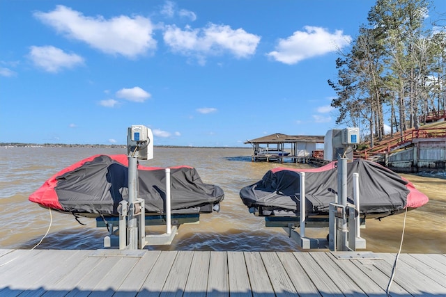 view of dock with a water view