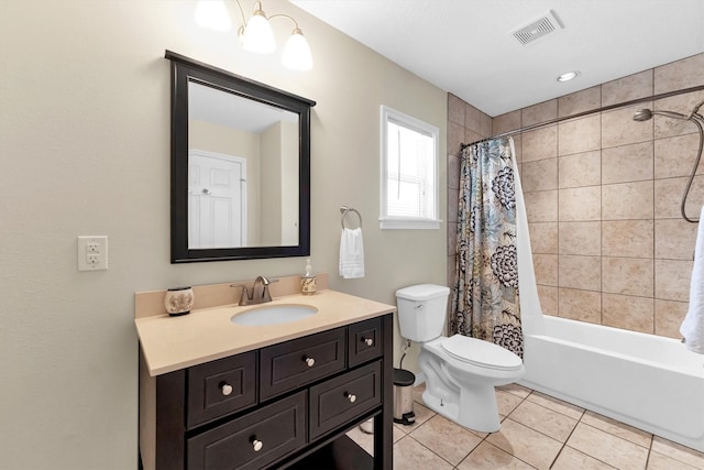 full bathroom featuring shower / tub combo with curtain, vanity, tile patterned floors, and toilet