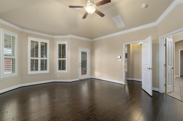 empty room with dark hardwood / wood-style flooring, crown molding, lofted ceiling, and ceiling fan