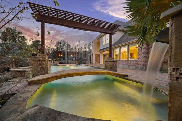 outdoor pool featuring a patio area and a pergola