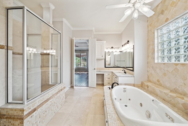 bathroom featuring vanity, crown molding, tile patterned floors, and shower with separate bathtub