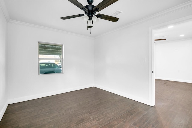 empty room featuring crown molding, ceiling fan, and dark hardwood / wood-style flooring