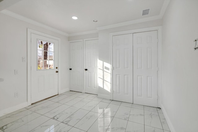 foyer entrance with ornamental molding