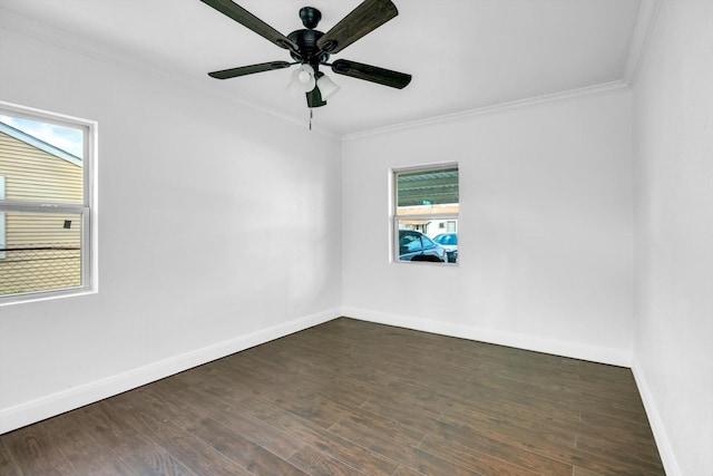 unfurnished room featuring dark hardwood / wood-style flooring, ceiling fan, crown molding, and a healthy amount of sunlight