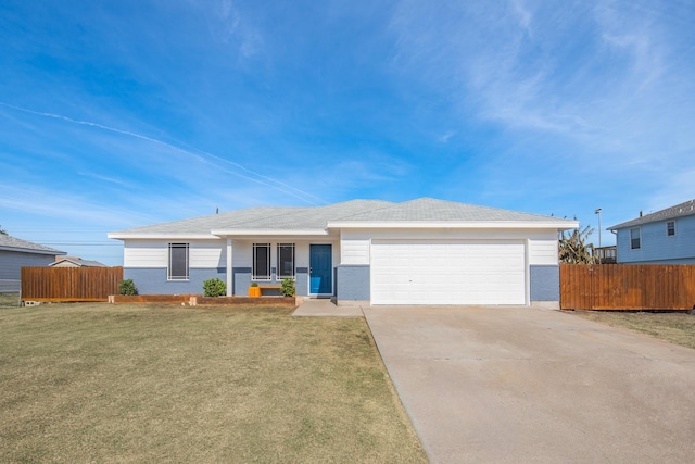 ranch-style house with a garage and a front yard