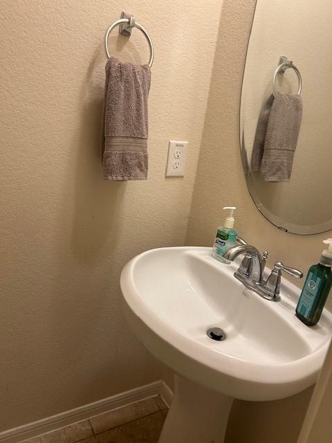 bathroom featuring sink and tile patterned floors