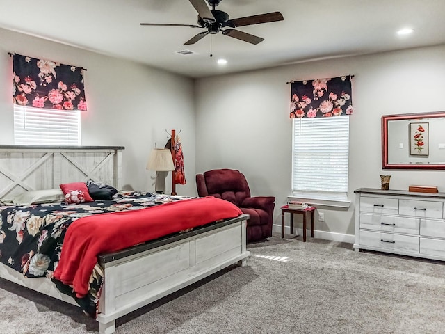 carpeted bedroom featuring ceiling fan