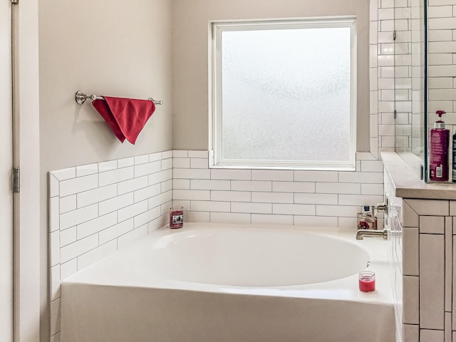 bathroom with a tub