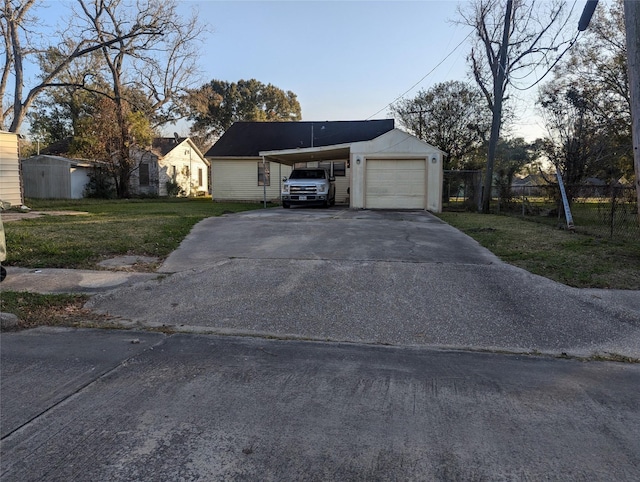 exterior space with a carport and a front yard