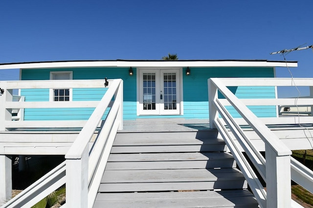 entrance to property featuring french doors