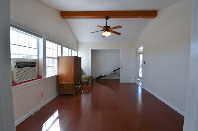 interior space featuring beam ceiling, dark wood-type flooring, and ceiling fan