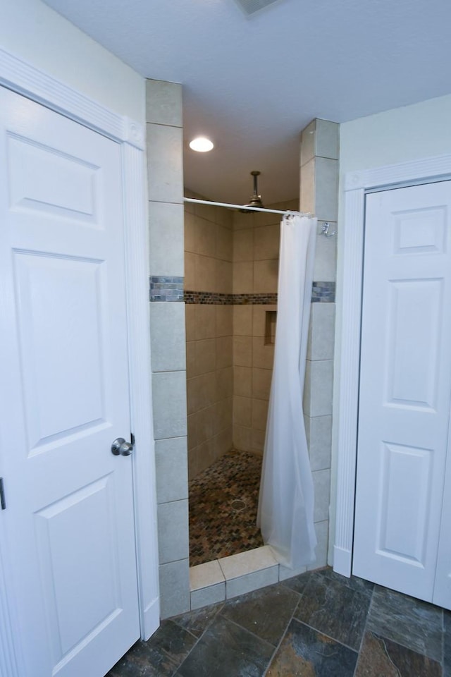 bathroom with curtained shower