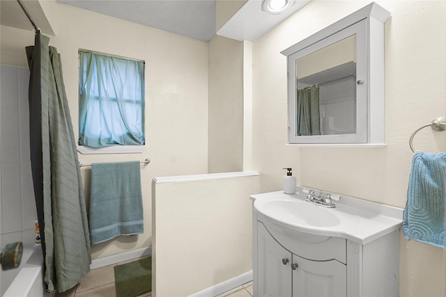 bathroom with tile patterned floors, vanity, and shower / bath combo